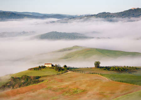 The misty morning in Pienza, Tuscany, Italy の写真素材