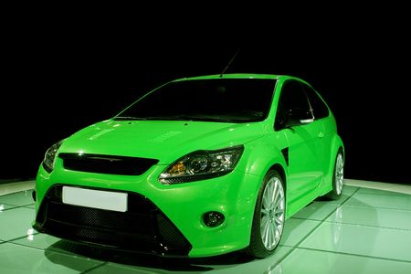 Green sports car on black groundの写真素材