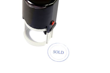 SOLD stamp on white ground