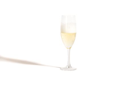 Champagne glass on white groundの写真素材