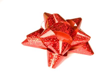 Red christmas bow on white groundの写真素材