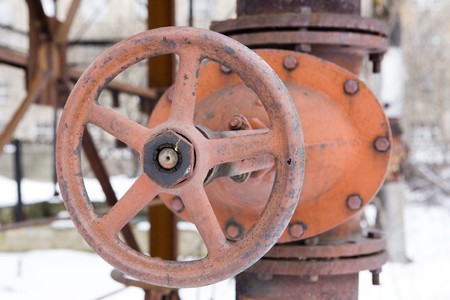 old rusted hydrant in winterの写真素材