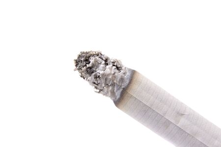 Burning cigarette on white groundの写真素材