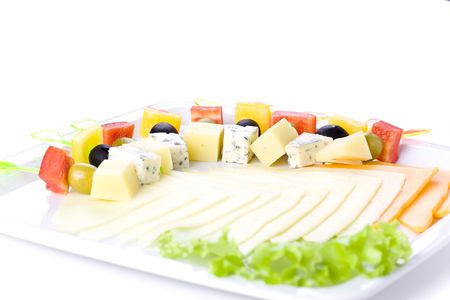 cheese and canape on white plateの写真素材