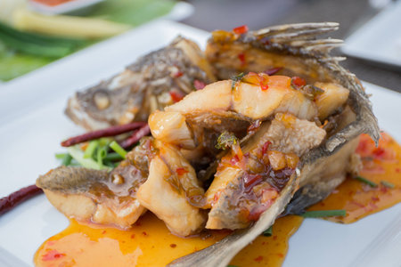 Fried Marinated Snapper with Sweet Fish Sauceの写真素材