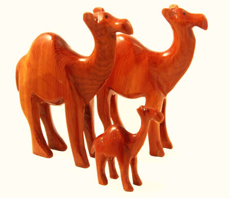 Handcraft Souvenir depicting three camels, isolated on whiteの写真素材
