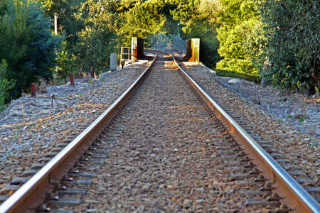 Railway line crossing a small steel bridge