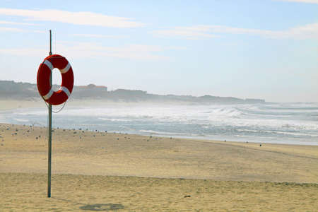 Lifebuoy on northern portuguese beachの写真素材