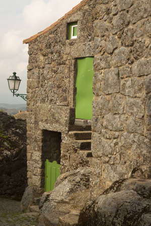 Ancient country-house carved in rocks in the village of Monsanto, in Portugalの写真素材