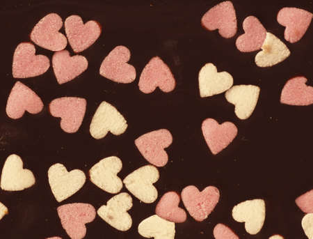 Detail of a Chocolate Bar with little Sugar Heartsの写真素材