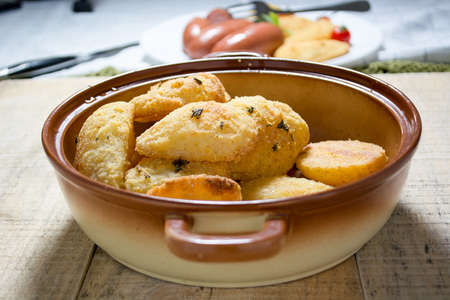 Breaded potato fried in the dish. Blurred backgroundの写真素材