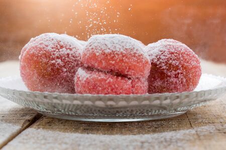 Close up colorful cookies dessert with vintage pastel tone and snowing sugarの写真素材