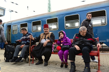 October 6,2015; Hegyeshalom in Hungary. Group of refugees leaving Hungary. They came to Hegyeshalom by train and then they leaving Hungary and go to Austria and then to Germany. Many of them escapes from home because of civil war.のeditorial素材