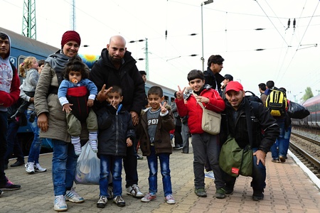 October 6,2015; Hegyeshalom in Hungary. Group of refugees leaving Hungary. They came to Hegyeshalom by train and then they leaving Hungary and go to Austria and then to Germany. Many of them escapes from home because of civil war.のeditorial素材