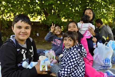 October 4, 2015; Bapska in Serbia. Group of refugees leaving Serbia. They came to Bapska by buses and then they leaving Serbia and go to Croatia and then to Germany. Many of them escapes from home because of civil war.のeditorial素材