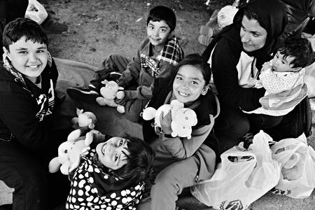October 4, 2015; Bapska in Serbia. Group of refugees leaving Serbia. They came to Bapska by buses and then they leaving Serbia and go to Croatia and then to Germany. Many of them escapes from home because of civil war.のeditorial素材