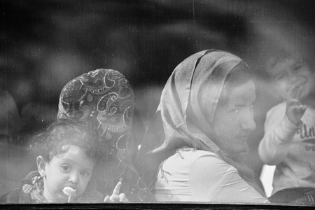 October 5, 2015; Tovarnik in Croatia. Croatian police assist refugees get into train which will go to Hungary.のeditorial素材