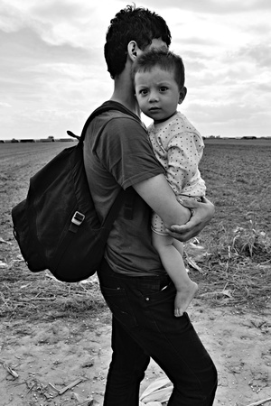 October 4, 2015; Sid in Serbia. Group of Afghan refugees leaving Serbia. They came to Sid by taxi and then they leaving Serbia and go to Croatia and then to Germany. Many of them escapes from home because of civil war.のeditorial素材