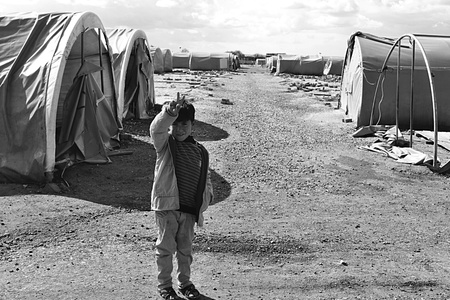 Syrian people in refugee camp in Suruc. These people are refugees from Kobane and escaped because of Islamic state attack. 30.3.2015, Suruc, Turkeyのeditorial素材