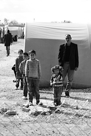 Syrian people in refugee camp in Suruc. These people are refugees from Kobane and escaped because of Islamic state attack. 30.3.2015, Suruc, Turkeyのeditorial素材