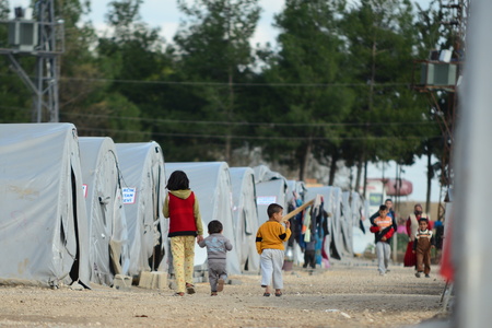 Syrian people in refugee camp in Suruc. These people are refugees from Kobane and escaped because of Islamic state attack. 3.4.2015, Suruc, Turkeyのeditorial素材