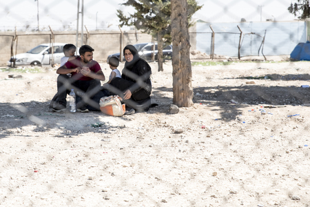 Syrian refugees (mainly from Aleppo and Idlib) entering Turkey in Kilis. Most of them will live in refugee camp. September 8, 2017; Kilis, Turkey.のeditorial素材