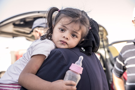 Syrian refugees (mainly from Aleppo and Idlib) entering Turkey in Kilis. Most of them will live in refugee camp. September 8, 2017; Kilis, Turkey.のeditorial素材