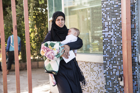 Syrian refugees (mainly from Aleppo and Idlib) entering Turkey in Kilis. Most of them will live in refugee camp. September 8, 2017; Kilis, Turkey.のeditorial素材