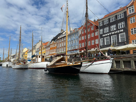 Scenic summer view of color buildings and boats of Nyhavn in Copenhagen, Denmarkの写真素材