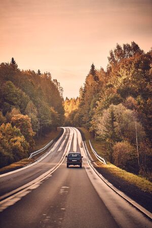 A road to the country on one autumn day.の写真素材