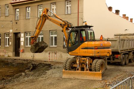 Excavator at work on the construction of new roads.Photo taken on: October 21th, 2014のeditorial素材