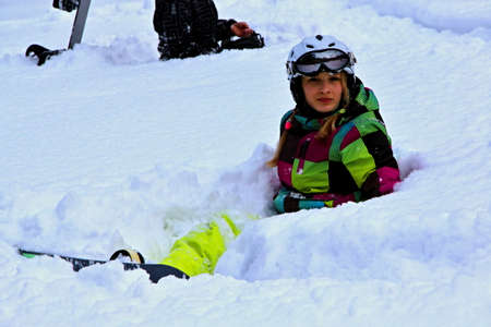 Beautiful snowboarder resting before riding.Photo taken on: 21/02/2013のeditorial素材