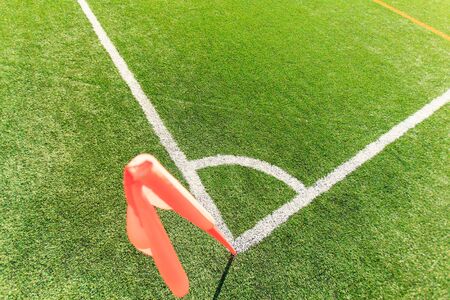 place a corner kick (in football). flag staking this territoryの写真素材