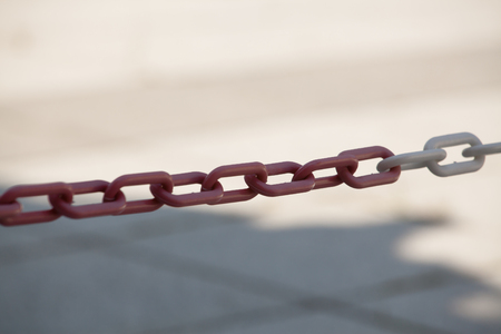 steel chain preventing access to the guarded site (Shallow DOF).の写真素材