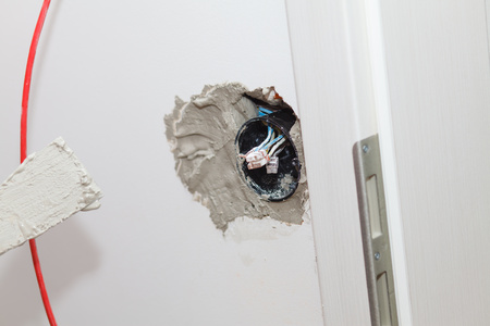 integrating new electrical outlets in new flatの写真素材