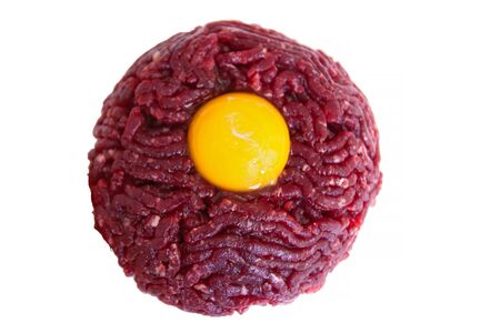 Closeup of a steak tartare on a white background.の写真素材