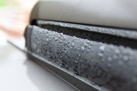 Closeup of water drops on a skylight. Shallow DOF.の写真素材