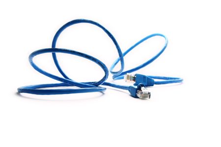 Closeup blue network cable over a white background