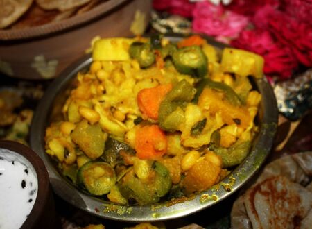 mix vegetable crush,potato ,aloo,served in steel bowl with a typical Indian food,pure villagers style delicious foodの写真素材