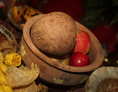 coconut,apple fruits served in Mud bowl with a typical Indian fruits,pure villagers style delicious...