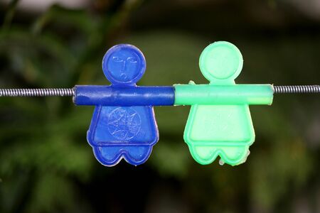 colorful hanging plastic character toy for kids playing, selective focus with blur background.