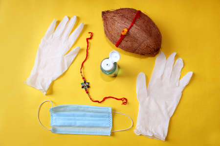 Raksha Bandhan Festival concept in Corona Virus or Covid-19, Rakhi or Wrist Band bracelet with...