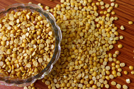 split pigeon peas ( Arhar Dal ) Organic Toor Dal in Bowl, Selective Focus with Blur Backgroundの写真素材