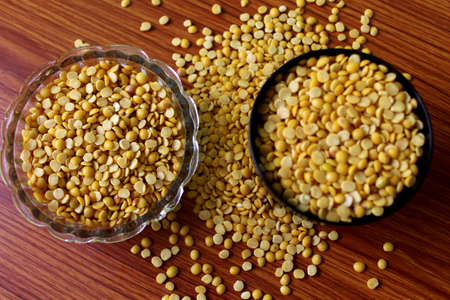 split pigeon peas ( Arhar Dal ) Organic Toor Dal in Bowl, Selective Focus with Blur Backgroundの写真素材