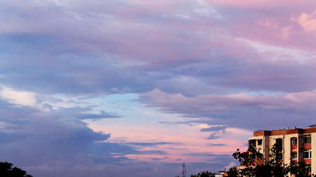 skyline urban landscape, sunset over a city, selective focus with blur.の写真素材