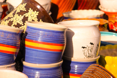 Traditional Indian handmade Items of Earthenware Or Ceramic at a Vendor Stall,decorative Sculpture Made with Earthen Mud, handcrafted traditional clay decoration toy in indian marketの写真素材