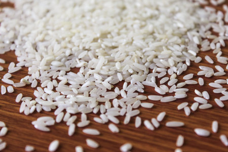 White rice bowl in wood isolated, Concept of Water-Conserving Products. Saving water. Horizontal...