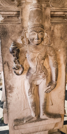Carvings of ancient stone sculpture of indian god at the 13th Century temple of rangnath swami in Indiaの写真素材
