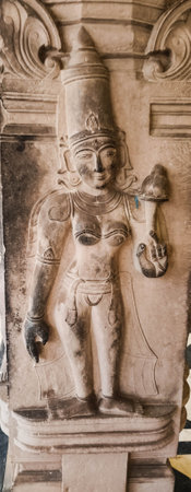 Carvings of ancient stone sculpture of indian god at the 13th Century temple of rangnath swami in Indiaの写真素材
