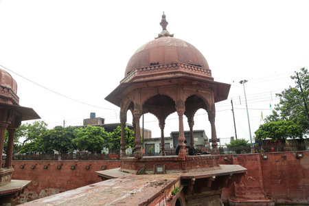 ancient Indian temple arches fragment,The sacred building carved from stone, Ancient rock curved temples at vrindavanの写真素材